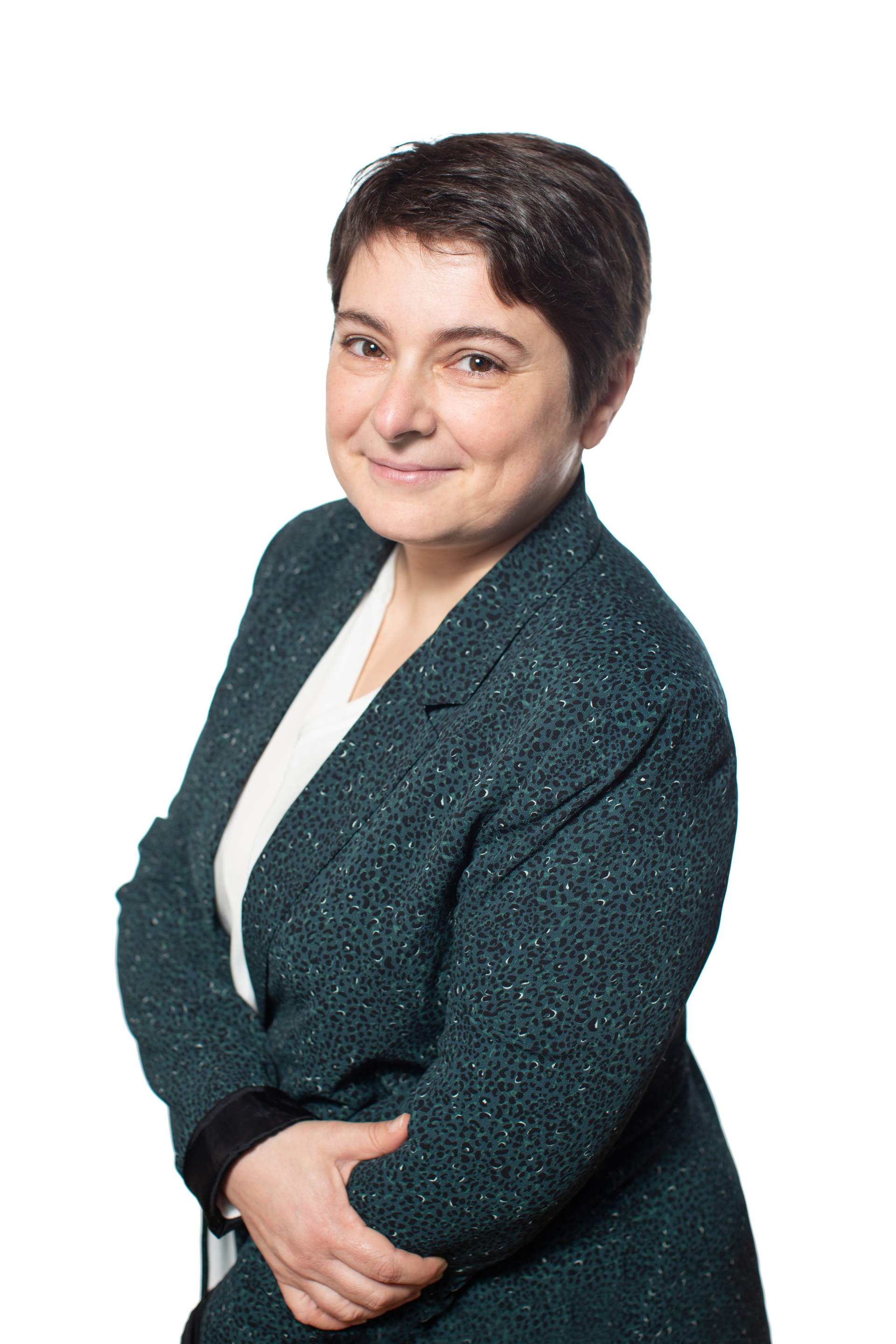 Marie Lacrampe smiling with arms crossed